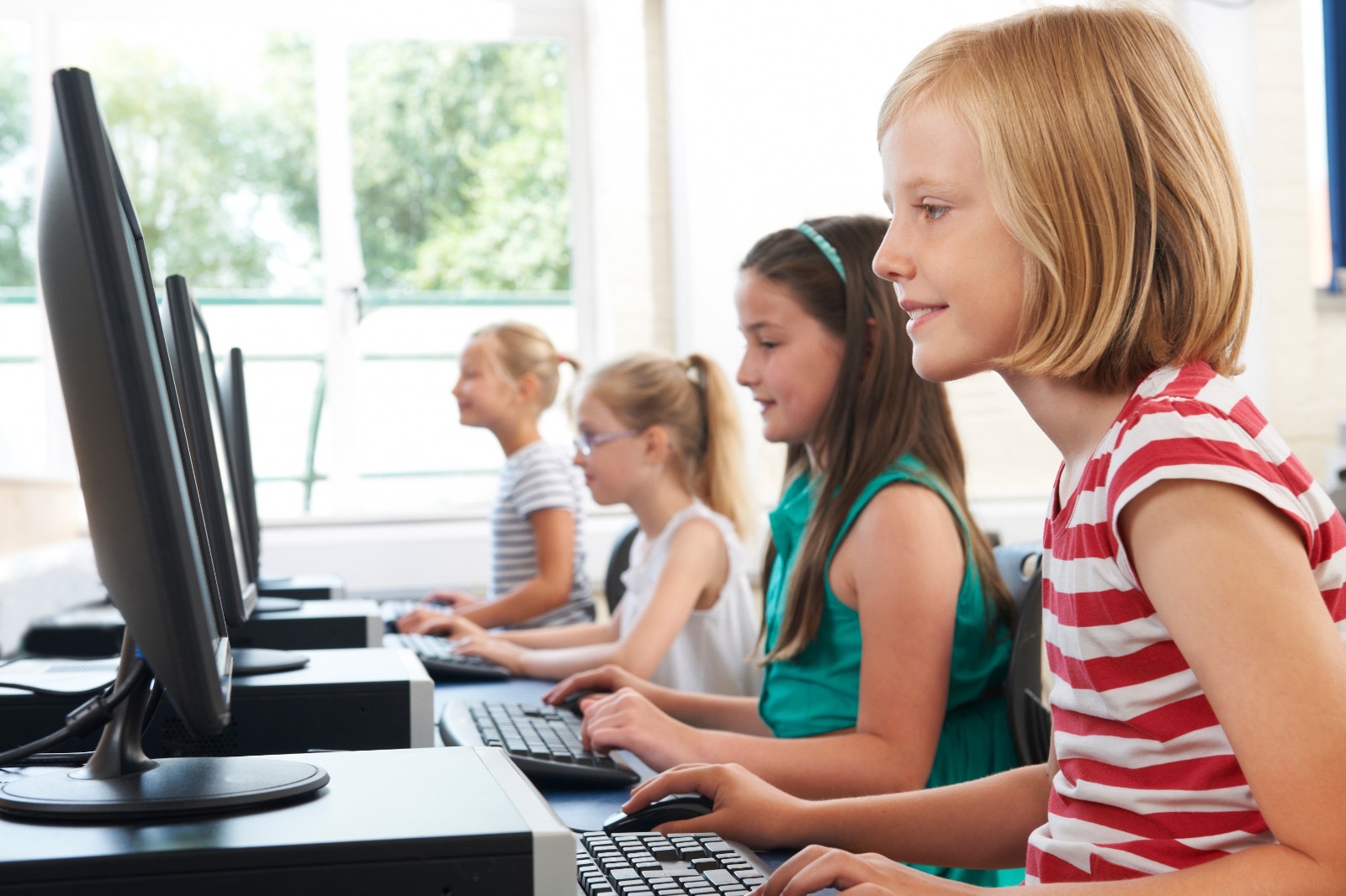 Students learning at computers